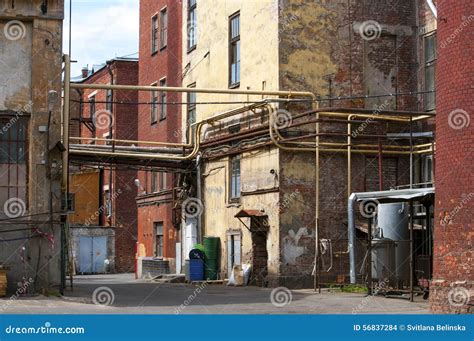 Grungy Yard Of A Small Factory In Russia Stock Photo Image Of