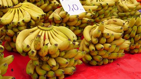 Banana bunch selling at fruit market 41470635 Stock Video at Vecteezy