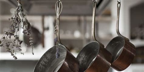 A 14 Towel Bar Is A Genius Way To Organize Pots And Pans Pots And