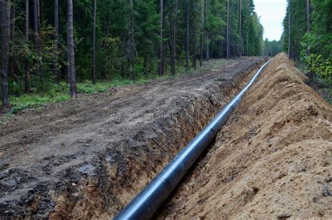 Natural Gas Pipeline Construction Work A Dug Trench In The Ground For