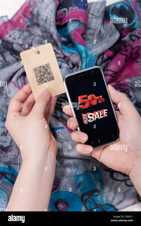 Human Hand Scanning Barcode With Mobile Phone Stock Photo Alamy