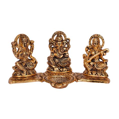 Buy Vintflea Decorative Laxmi Ganesha Saraswati Sitting Diya Statue