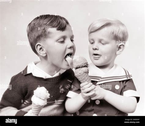 Children Licking Ice Cream Cones Hi Res Stock Photography And Images