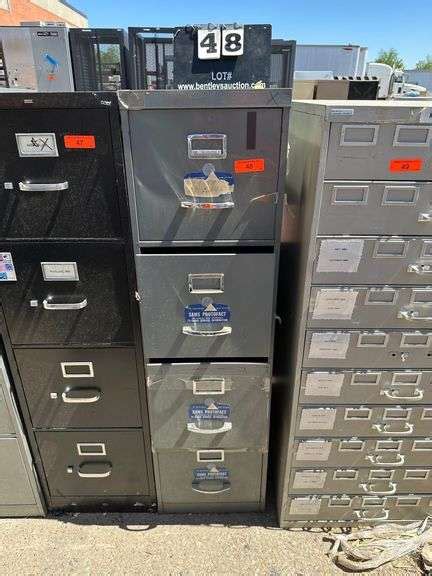 METAL 4-DRAWER FILE CABINET - Bentley & Associates, LLC