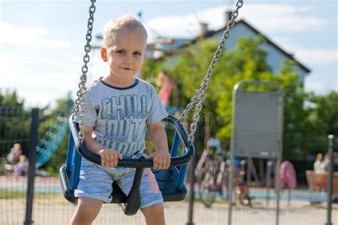 On The Playground Child Plays Stock Photo Image Of Absorption