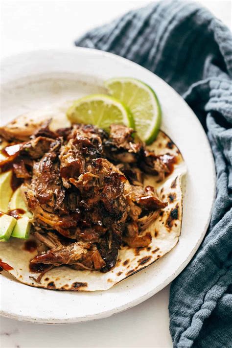 Easy Crockpot Carnitas Recipe Pinch Of Yum