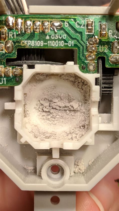 The inside of a 17 year old n64 joystick. : r/n64