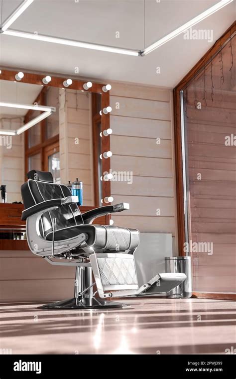 Stylish Hairdresser S Workplace With Professional Armchair And Large