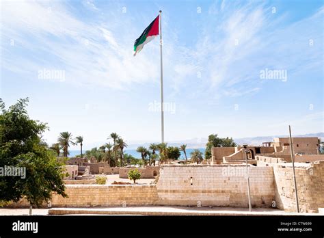 The Aqaba Flagpole Under Ruins Of Medieval Mamluks Aqaba Fort Stock