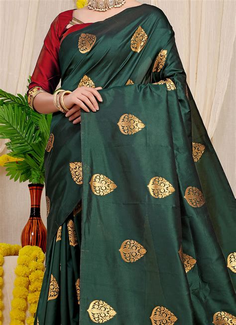 Shop Patola Silk Bottle Green Color Zari Weaving Work Saree Party Wear