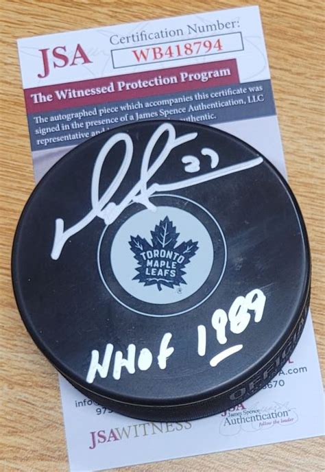 Autographed Darryl Sittler Hhof 1989 Toronto Maple Leafs Hockey Puck Jsa Witness Main Line