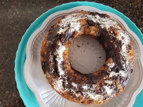 A Cake Sitting On Top Of A Blue And White Plate