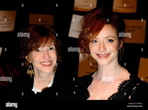 Actress Christina Hendricks And Her Mother Jackie Attend The Badgley Mischka Fall 2010