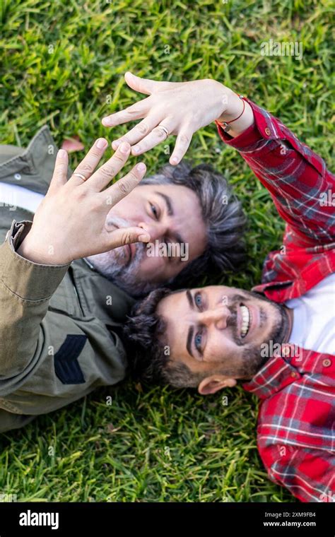 Happy Gay Couple Cuddling On Hi Res Stock Photography And Images Alamy