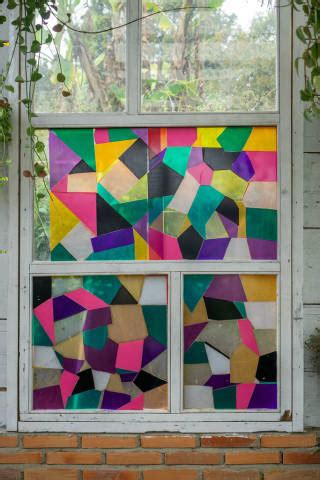 Wooden Window With Colored Stained Glass With Hanging Plants