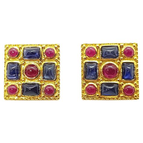 Cabochon Blue Sapphire With Cabochon Ruby Earrings Set In 18 Karat Gold