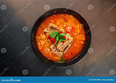 Homemade Hot Vegetable Soup With Bulgur Tomatoes And Ribs On A Dark