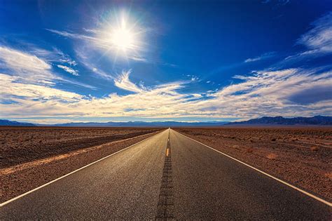 Royalty Free Photo Gray Asphalt Road Between Desert Field During