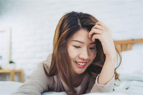 Portrait Beautiful Young Asian Woman On Bed At Home In The Morning