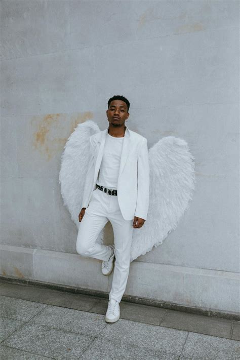 A Man Wearing An Angel Costume · Free Stock Photo