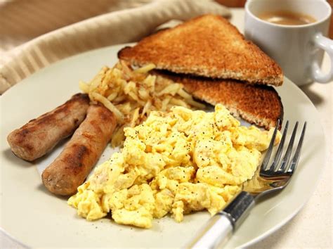 Scrambled Eggs Hash Browns Sausage Links And Toast Breakfast