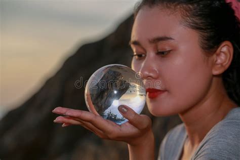 View of Sunset Inside Crystal Ball Stock Photo - Image of lady, beach ...