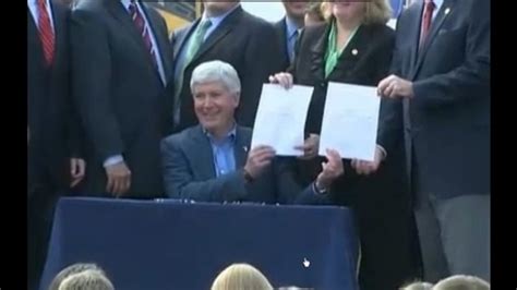 Gov Rick Snyder Signs Michigan Roads Funding Bills Package