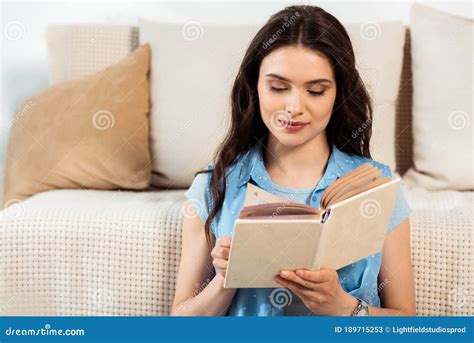Beautiful Brunette Woman Reading Book At Stock Image Image Of