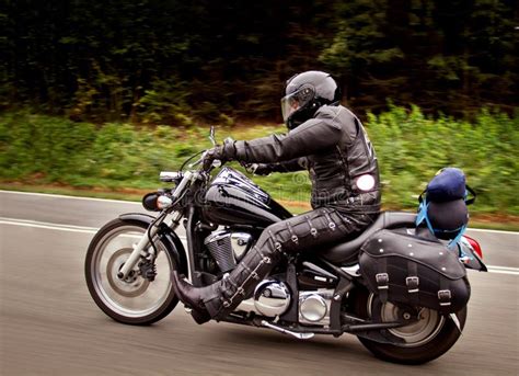 Biker Riding Fast On His Motorbike Speed Blur Effect Stock Photo