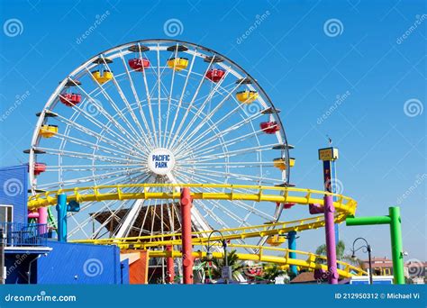 West Roller Coaster And Ferris Wheel In Amusement Pacific Park On