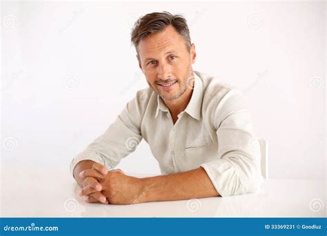 Happy Man Sitting With Hands On Table Stock Image Image Of Sitting