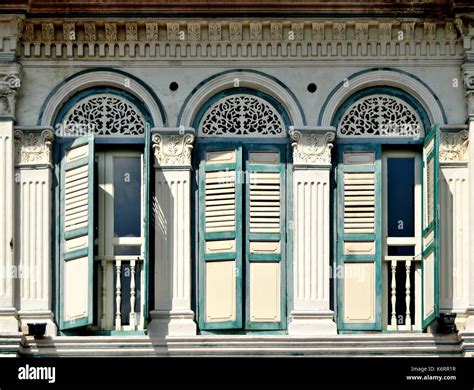 Traditional Singapore Shop House Exterior With Arched Windows Wooden