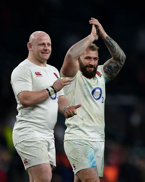 England Rugby Players Celebrating with Fans at Twickenham Stadium