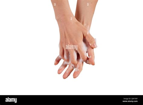 A Woman Clasping Hands And Spreading Soap Foam During Hygienic Routine