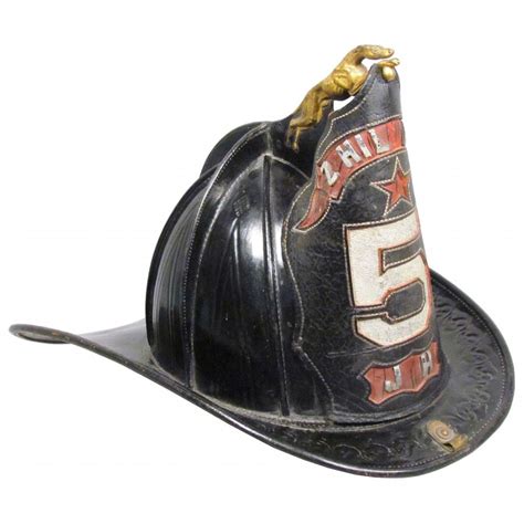 A Firemans Hat With The Number Five On It