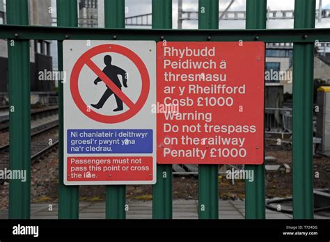 Bi Lingual Railway Trespass Warning Sign At Cardiff Central Sign In