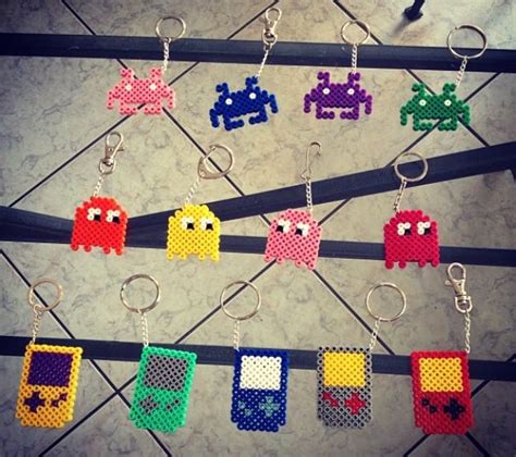 The Pixel Keychains Have Been Made To Look Like Pac Man And Other