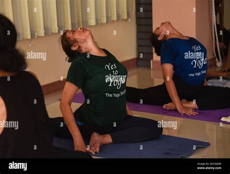 People Participate In A Yoga Session To Mark International Yoga Day In