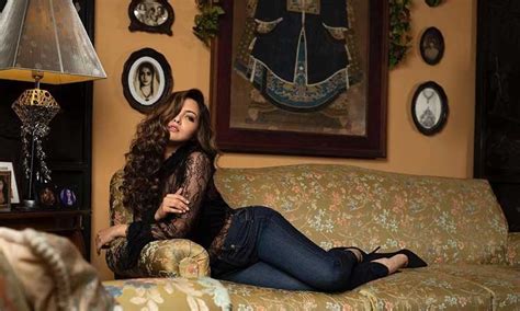 Gorgeous Riya Sen Sizzles In Black Chic Printed Bikini