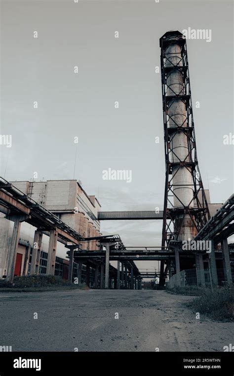 A Birds Eye View Of An Abandoned Industrial Area Featuring A Tall