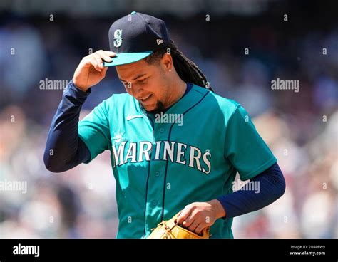 Seattle Mariners starting pitcher Luis Castillo walks off the field ...