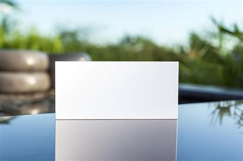 Premium Photo A Blank Card Sitting On Top Of A Table