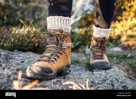 Hiking Boot And Alpaca Sock Legs With Ankle Boots On Mountain Trekking