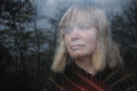 2400 Person Looking Out Window Rain Stock Photos Pictures And Royalty