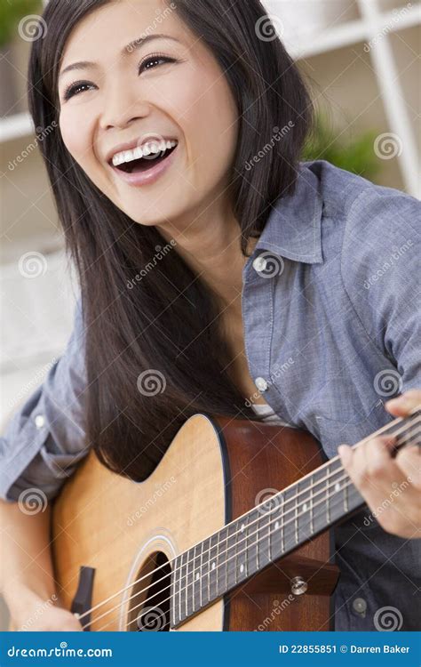 Beautiful Chinese Oriental Woman Smiling And Guitar Stock Image Image