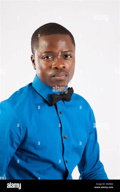 Handsome Black Man Looking Thoughtfully At The Camera Stock Photo Alamy