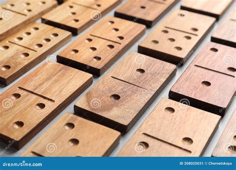 Set Of Wooden Domino Tiles On Grey Table Closeup Stock Image Image