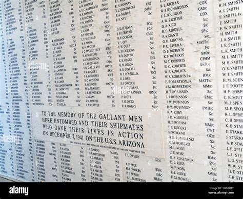 Memorial wall listing names of sailors who died aboard the Arizona at the Memorial in Pearl ...