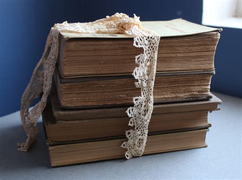 Stack Of Antique Books In Neutral Colors