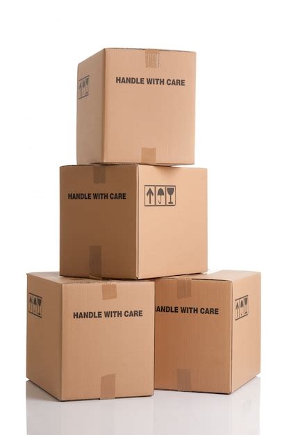 Premium Photo Pile Of Cardboard Boxes Ready To Be Shipped Isolated On